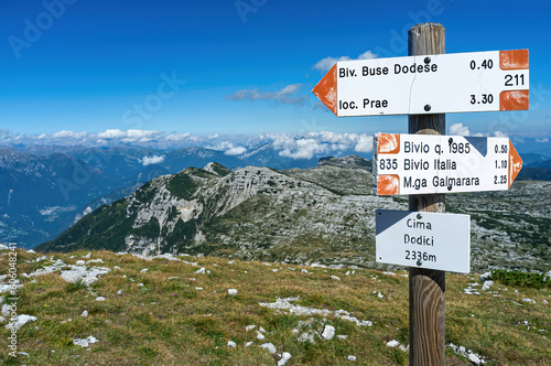 Indicative signs for hikers at Cima Dodici