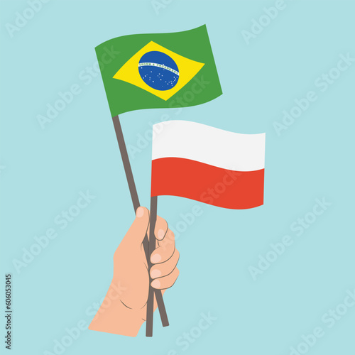 Flags of Brazil and Poland  Hand Holding flags