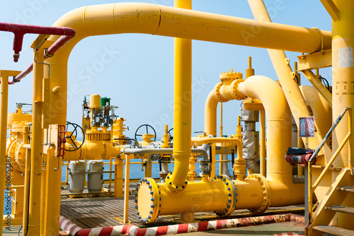 Oil and gas processing plant with pipe line valves.Steel pipelines and valves.Oil pipeline valves in the oil and gas industry.