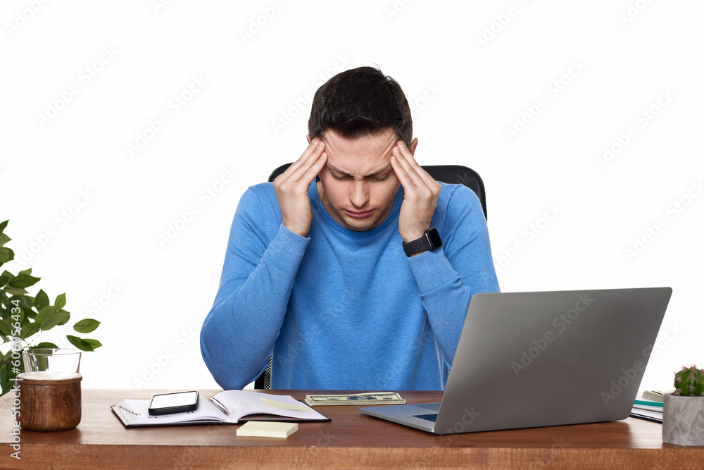 man have a headache, using laptop in office man have a headache, using laptop in office