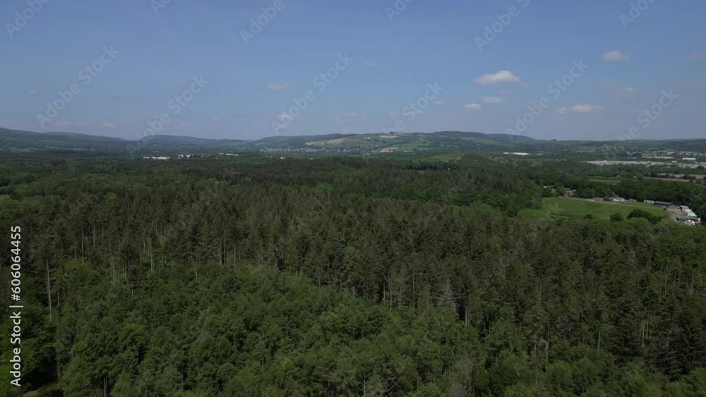 Stover Country Park, South Devon, England: DRONE AERIAL VIEWS: Heavily forested area of the park with clay quarries in the distance. Stover Country Park, South Devon, England: DRONE AERIAL VIEWS: Heavily forested area of the park with clay quarries in the distance.