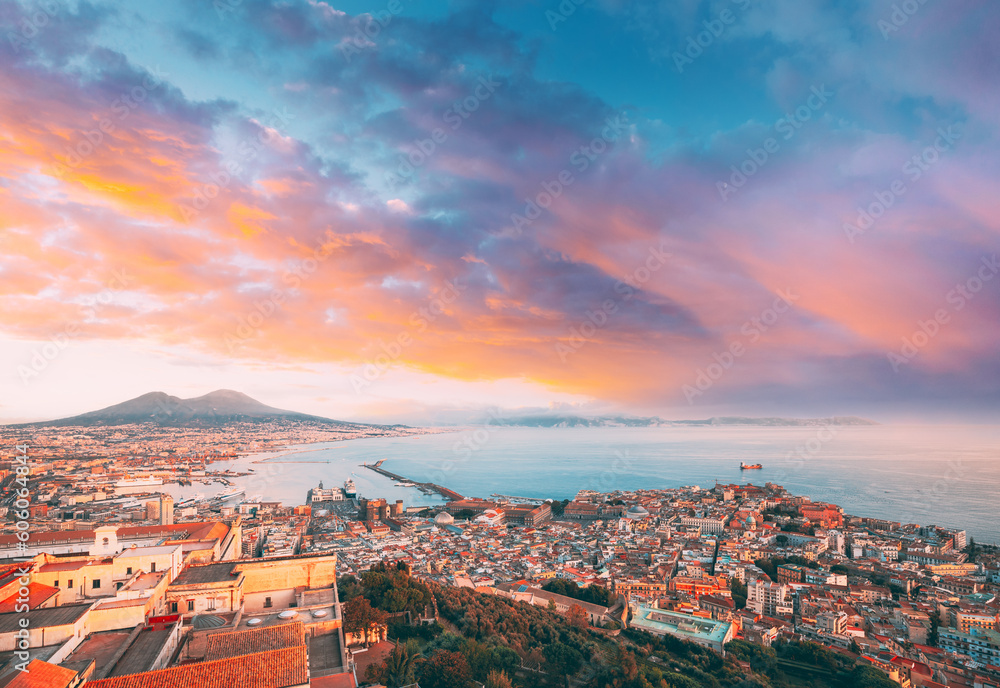 Naples, Italy. Top View Skyline Cityscape City In Evening Sunset. Tyrrhenian Sea And Landscape With Volcano Mount Vesuvius Naples, Italy. Top View Skyline Cityscape City In Evening Sunset. Tyrrhenian