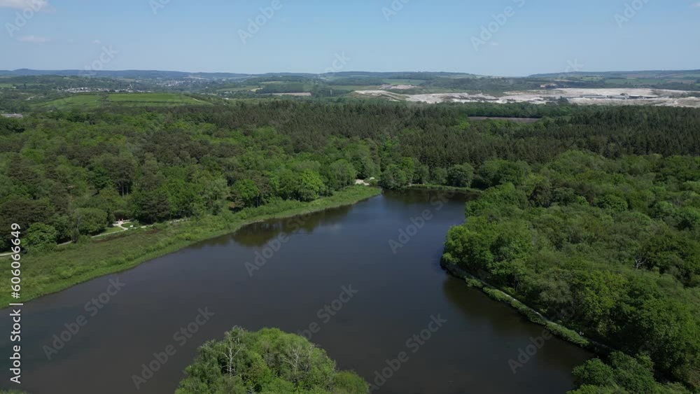 Stover Country Park, South Devon, England: DRONE AERIAL VIEWS: Devon hills, clay quarries, dense woodland and Stover Lake (Clip 1) Stover Country Park, South Devon, England: DRONE AERIAL VIEWS: Devon hills, clay quarries, dense woodland and Stover Lake (Clip 1)
