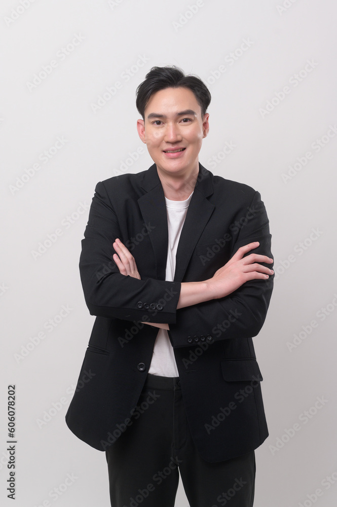 Young businessman wearing suit over white background studio Young businessman wearing suit over white background studio