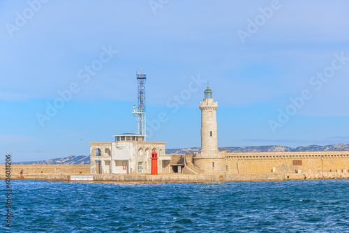 A scenic view of the lighthous and communication center of the port of Marseille, bouches-du-rhône, France under a majestic blue sky