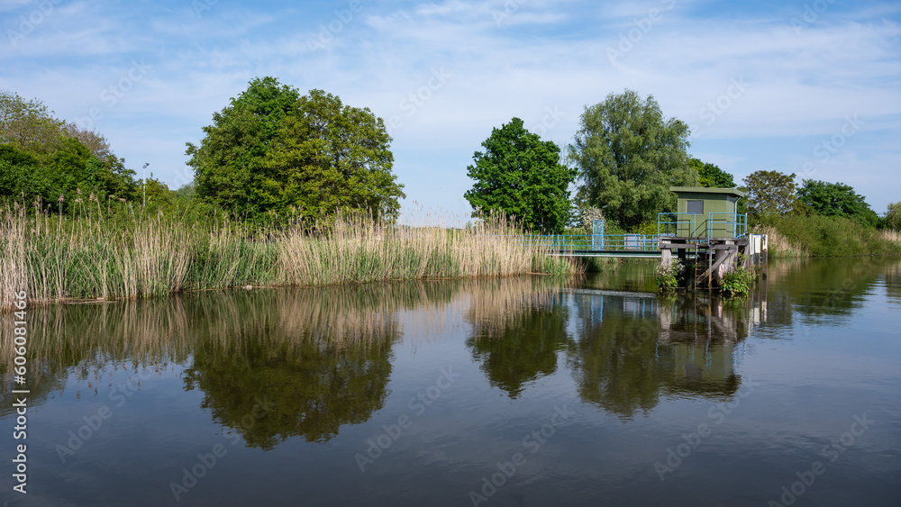 Scenic view over nature reflections in the water of the River Durme, Tielrode, Belgium Scenic view over nature reflections in the water of the River Durme, Tielrode, Belgium