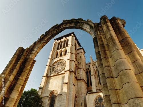 View of tower of St Jean Cathedral through arch of 5th century cathedral ruins in old Lyon district (archeological garden), France