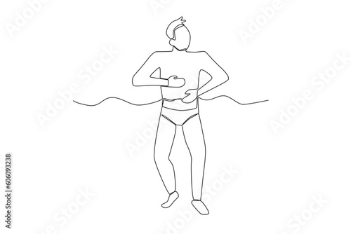 A man getting ready to swim on the beach. Swimming in beach one-line drawing