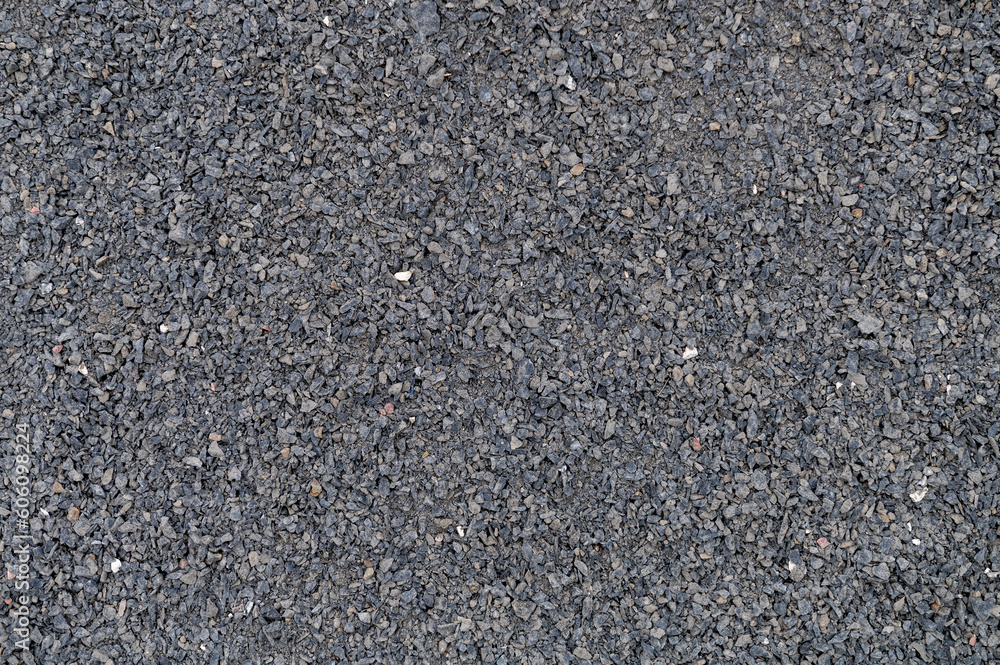 Small gravel as a background. Granite gravel background. Building stone. Banner design Small gravel as a background. Granite gravel background. Building stone. Banner design