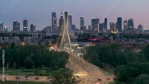 Aerial, elevation view of Warsaw city a capital of Poland over Swietokrzyski Bridge during sunset. photo