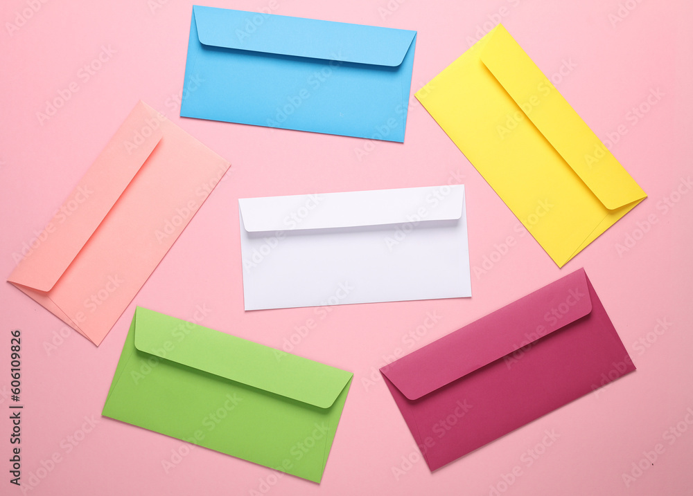 Set of colored envelopes on pink background. Creative layout Set of colored envelopes on pink background. Creative layout