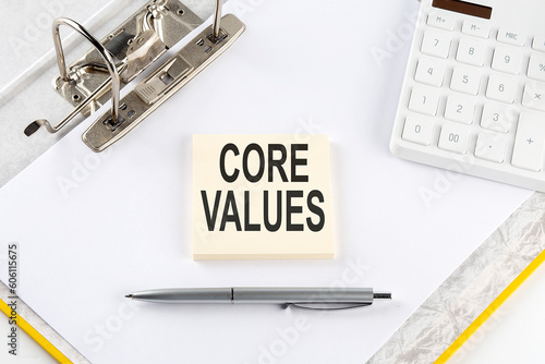 CORE VALUES - business concept, message on the sticker on folder background with calculator photo