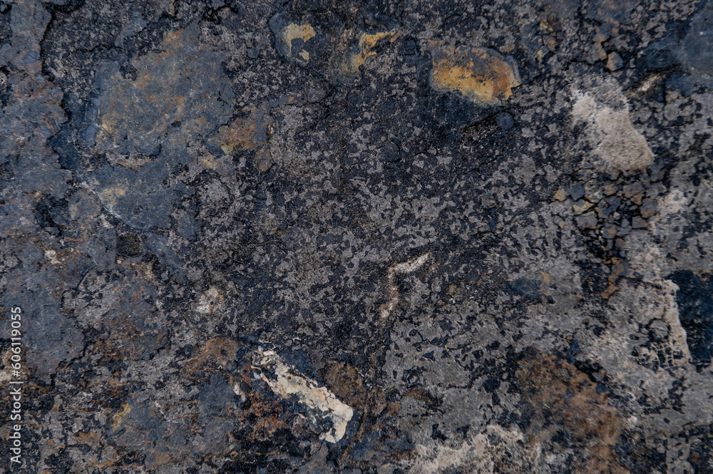 Granite surface as background. Grunge stone texture. Basalt. Rock surface background Granite surface as background. Grunge stone texture. Basalt. Rock surface background
