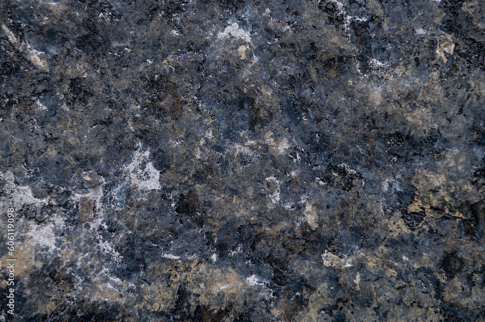 Granite surface as background. Grunge stone texture. Basalt. Rock surface background