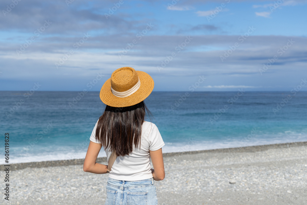 Tourist woman enjoy the sea view