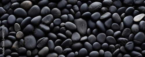 a birds-eye view of Black river stones in a horizontal format for a product backdrop, Abtract-themed, photorealistic illustrations in JPG. Generative AI © Purple Penguin GFX