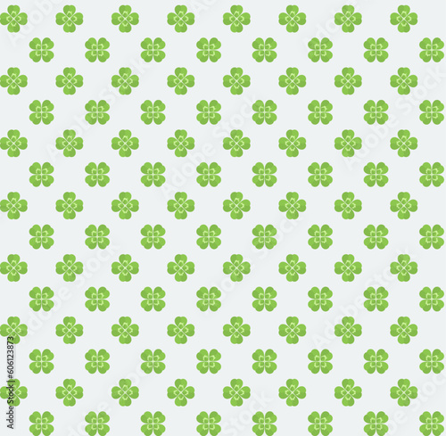 Clover. Seamless pattern of green clover leaves. Vector illustration isolated on light gray background.