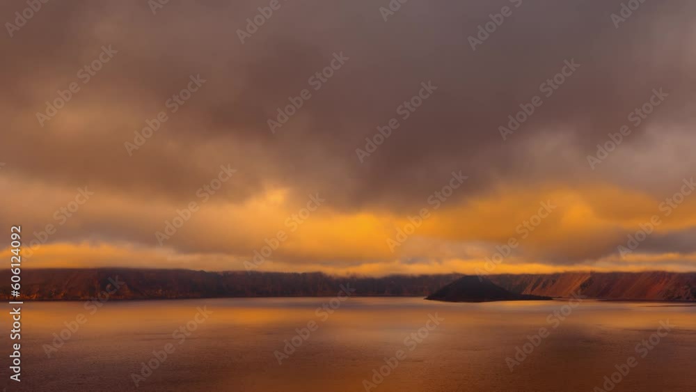 Time lapse of sunset clouds moving across the sky above Crater Lake in Oregon Time lapse of sunset clouds moving across the sky above Crater Lake in Oregon