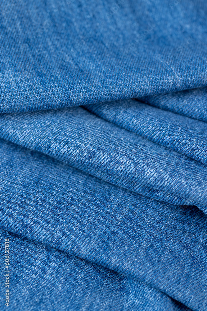 details of a blue denim fabric made of natural cotton
