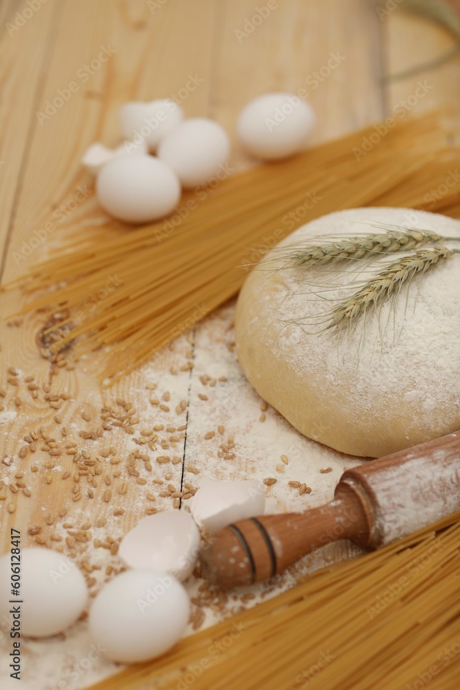 Spaghetti, dough, chicken eggs, rolling pin, cheese, two ears of wheat, wheat flour, on a wooden table, cooking, background, background image, wallpaper Spaghetti, dough, chicken eggs, rolling pin, cheese, two ears of wheat, wheat flour, on a wooden table, cooking, background, background image, wallpaper