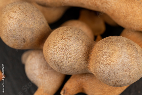 long ripe tamarind pods close up