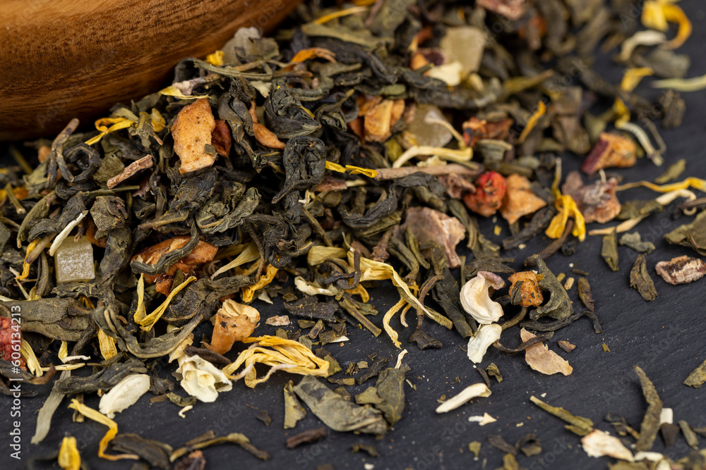 fresh green tea with pieces of fruit and berries fresh green tea with pieces of fruit and berries