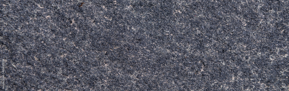 Grey granite surface. Grunge stone texture. Basalt surface background Grey granite surface. Grunge stone texture. Basalt surface background