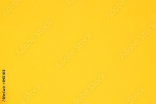 A background of a plain yellow wall