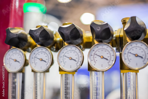 Obraz na plátně Flowmeter, rotameter - water flow regulator for cooling system of injection moulding machine at plant, factory - close up