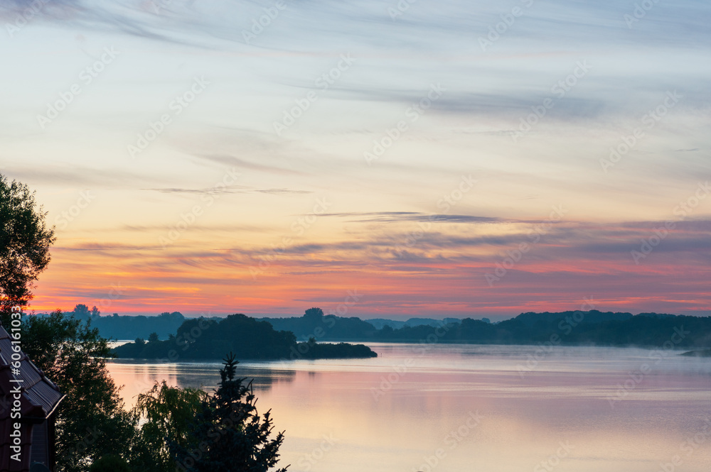 Misty sunrise over the lake