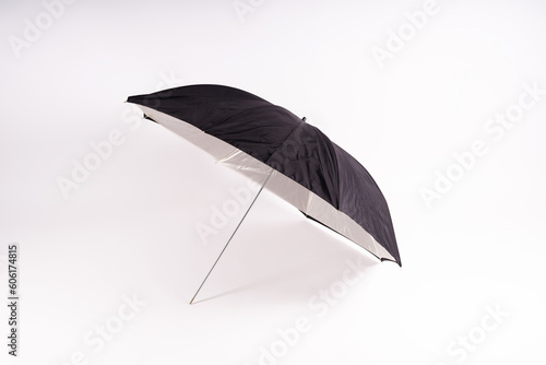 Photography studio light reflector - isolated on white background umbrella.