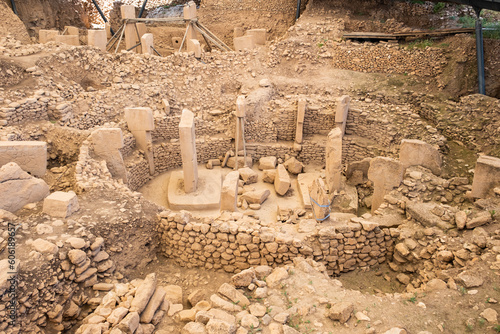 Gobekli Tepe is an ancient site in Turkey that dates back approximately 11,000 years. It is considered one of the oldest examples of monumental architecture. photo