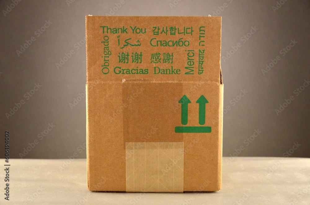 A cardboard box with green inscriptions A cardboard box with green inscriptions
