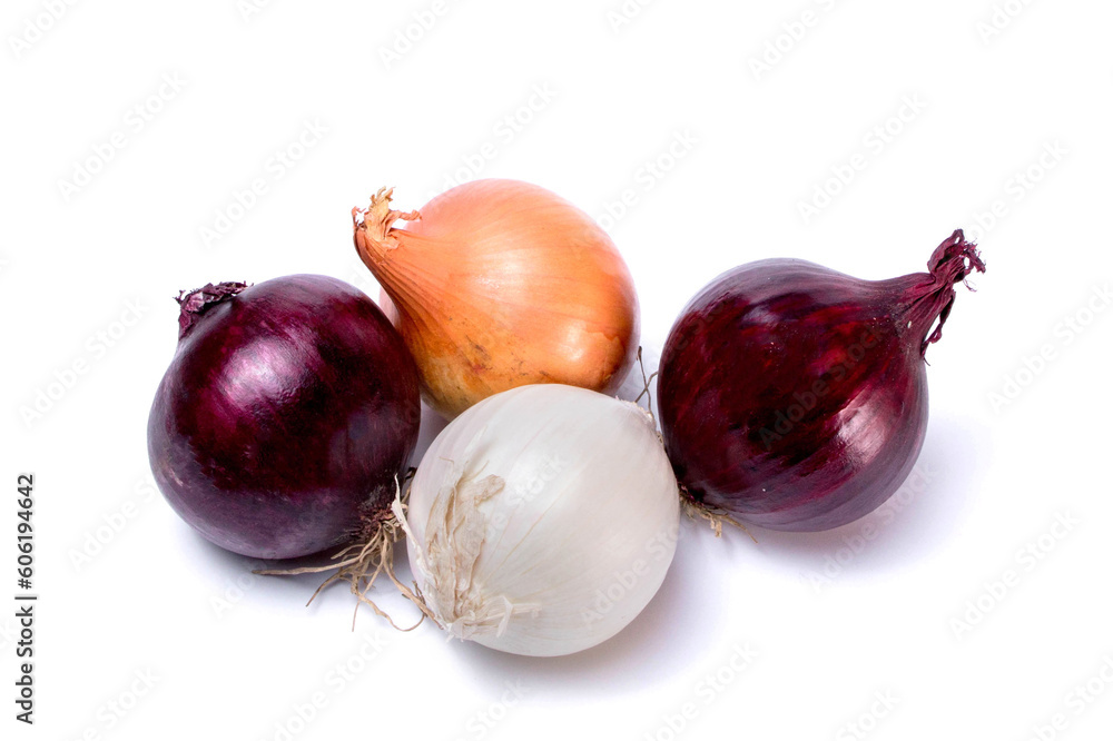 Different varieties of onions, red, white, golden isolated on a white background. View from above Different varieties of onions, red, white, golden isolated on a white background. View from above