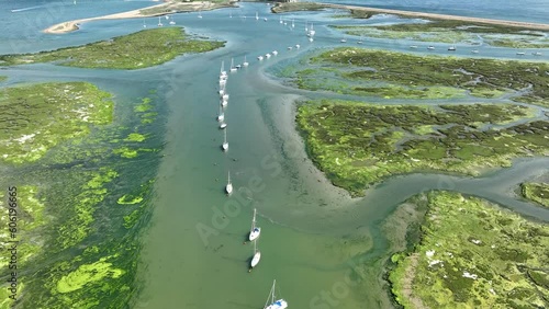 Hurst Point near Milford on Sea. Swamp and yachts. Cinematic drone flight photo