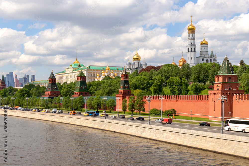 Red Kremlin wall, towers and churches over Moskva river, Russia