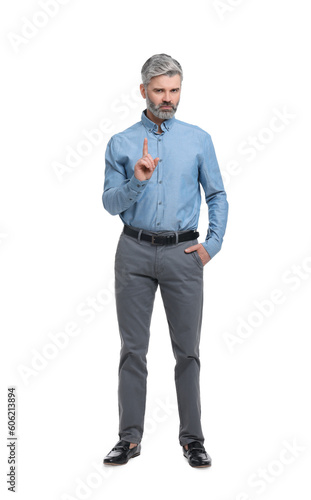 Mature businessman in stylish clothes posing on white background