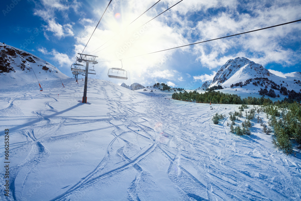 ski lift on a snow covered mountain