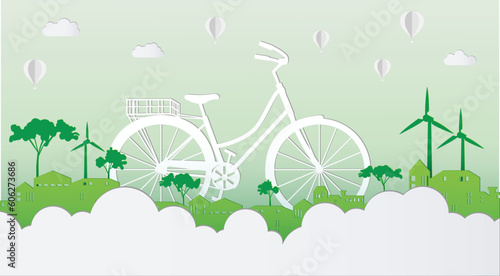 Bicycle with green eco cityscape abstract paper cut background.Vector paper cut style.