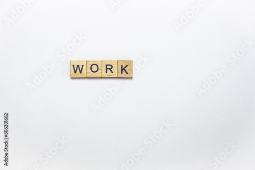 Business and work concept. Inscription with wooden cubes with letters on a white background.
