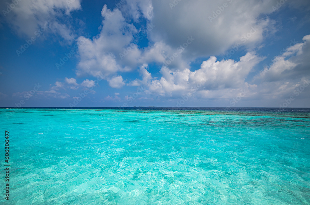 Mediterranean tropical sea blue seascape with relaxing white clouds horizon line and azure sky. Turquoise ocean lagoon bay. Panoramic Earth ecology environment concept. Crystal clear seaside Mediterranean tropical sea blue seascape with relaxing white clouds horizon line and azure sky. Turquoise ocean lagoon bay. Panoramic Earth ecology environment concept. Crystal clear seaside