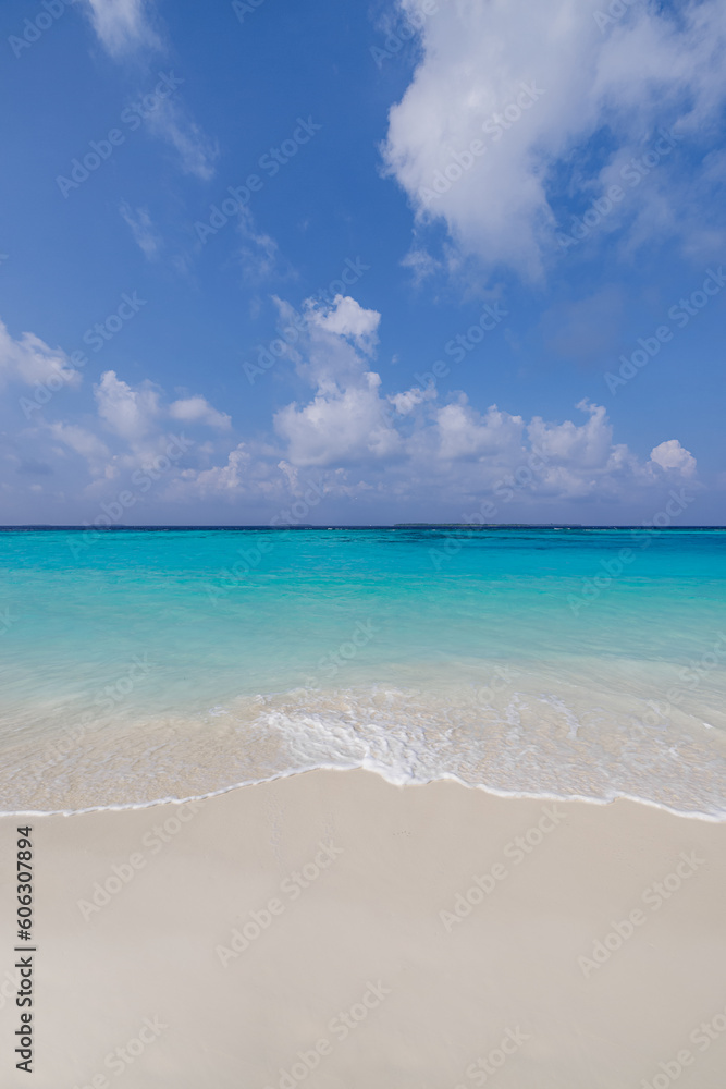Fototapeta premium Sunny closeup of sea sand beach blue summer sky. Panoramic beach landscape. Tranquil relaxing sunshine soft waves splashing on Mediterranean sandy shore. Coastline seaside idyllic nature background