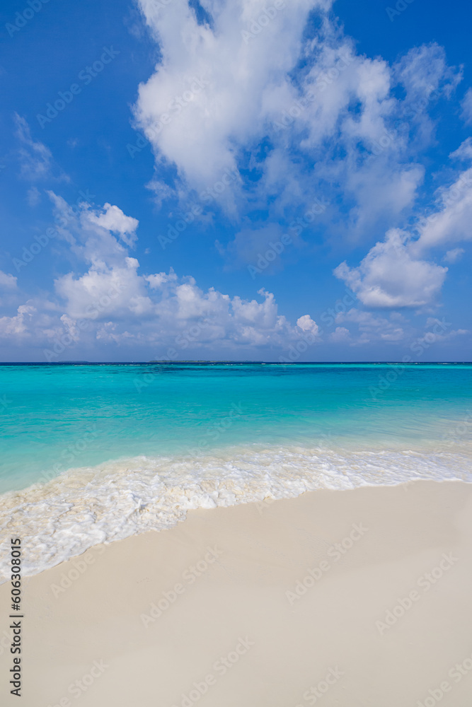 Sunny closeup of sea sand beach blue summer sky. Panoramic beach landscape. Tranquil relaxing sunshine soft waves splashing on Mediterranean sandy shore. Coastline seaside idyllic nature background