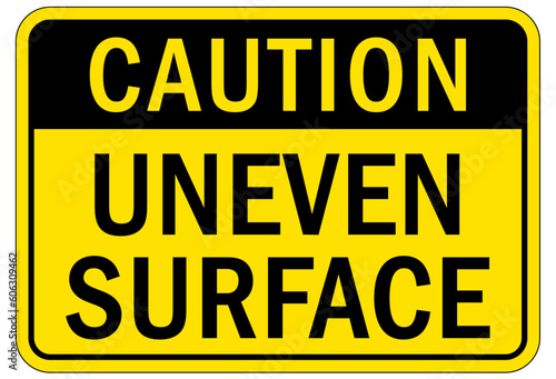 Slip and trip hazard sign and labels uneven surface