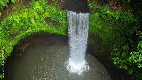 Tibumana Waterfall referred to by locals as Air Terjun Tibumana is one of the most beautiful hidden waterfalls in Bali, which located in Bangli region.	 photo