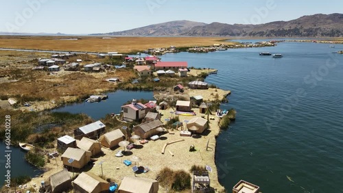 Panoramic aerial view of floating reed islands Uros at Lake Titicaca, Peru