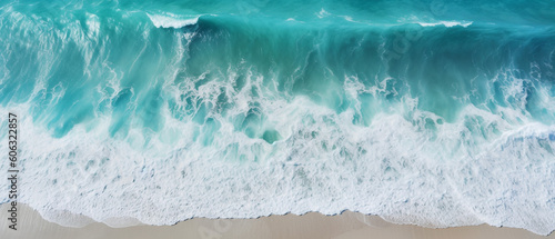 Top view of blue ocean waves at the beach