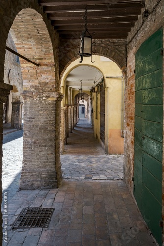 The ancient arcades of the medieval village of Urbania in the Marche region of Italy © Antonio