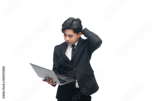 Portrait of a young business asian man using his on laptop computer while standing isolated over white background
