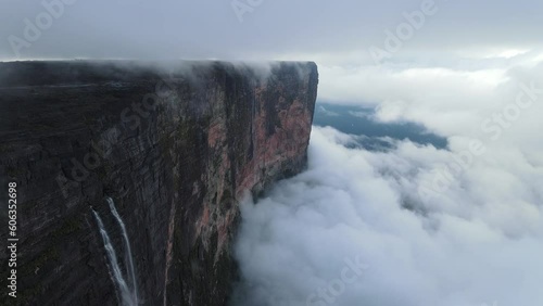 Cinematic aerial view of Tepuy Roraima huge wall mountain with waterfalls, Venezuela, Canaima National Park, South America photo